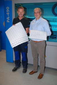 Ruedi Sässler and Roger Straessle display some of the pocket coils manufactured by the Spühl machinery